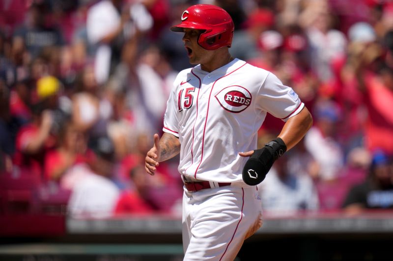 Jun 25, 2023; Cincinnati, Ohio, USA; Cincinnati Reds third baseman Nick Senzel (15) reacts after scoring on a double hit by Cincinnati Reds second baseman Matt McLain (not pictured) in the fourth inning of a baseball game against the Atlanta Braves at Great American Ball Park. The Atlanta Braves won, 7-6. Mandatory Credit: Kareem Elgazzar-USA TODAY Sports