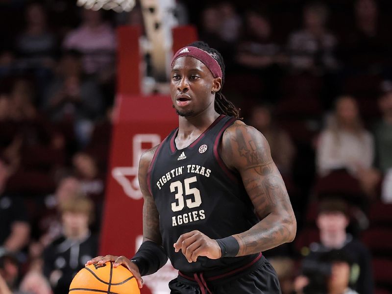 Dec 22, 2023; College Station, Texas, USA; Texas A&M Aggies guard Manny Obaseki (35) handles the ball against the Houston Christian Huskies during the first half at Reed Arena. Mandatory Credit: Erik Williams-USA TODAY Sports