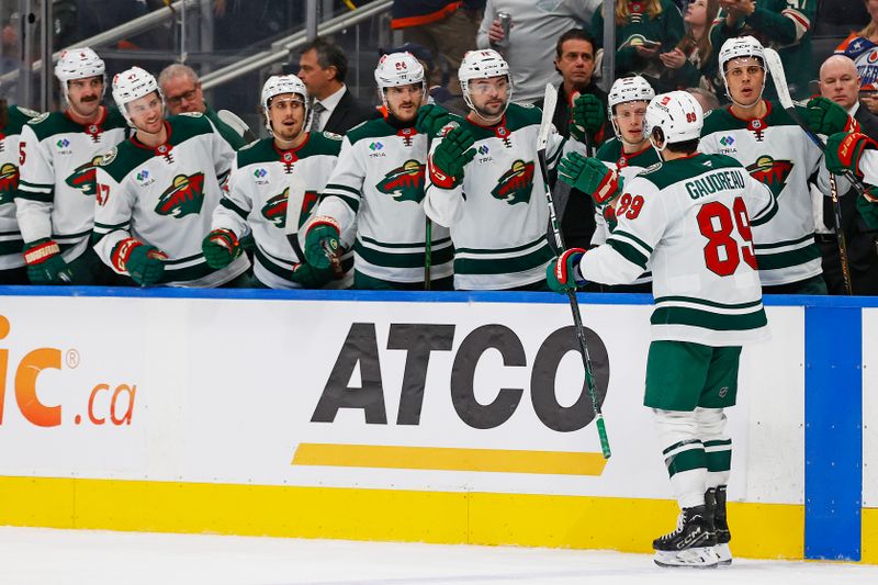 Nov 21, 2024; Edmonton, Alberta, CAN; The Minnesota Wild celebrate a goal scored by forward Frederick Gaudreau (89) during the second period against the Edmonton Oilers at Rogers Place. Mandatory Credit: Perry Nelson-Imagn Images