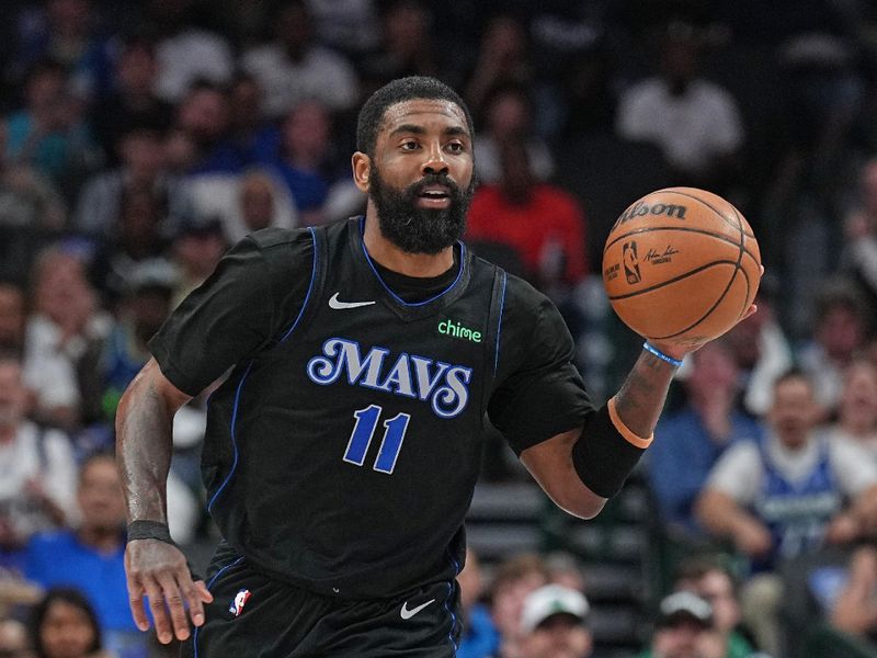 DALLAS, TX - FEBRUARY 22: Kyrie Irving #11 of the Dallas Mavericks brings the ball up court during the game against the Phoenix Suns on February 22, 2024 at the American Airlines Center in Dallas, Texas. NOTE TO USER: User expressly acknowledges and agrees that, by downloading and or using this photograph, User is consenting to the terms and conditions of the Getty Images License Agreement. Mandatory Copyright Notice: Copyright 2024 NBAE (Photo by Glenn James/NBAE via Getty Images)