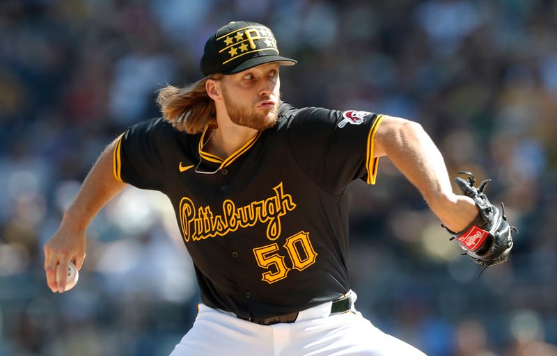 Jun 8, 2024; Pittsburgh, Pennsylvania, USA;  Pittsburgh Pirates starting pitcher Carmen Mlodzinski (50) delivers a  pitch against the Minnesota Twins during the first inning at PNC Park. Mandatory Credit: Charles LeClaire-USA TODAY Sports