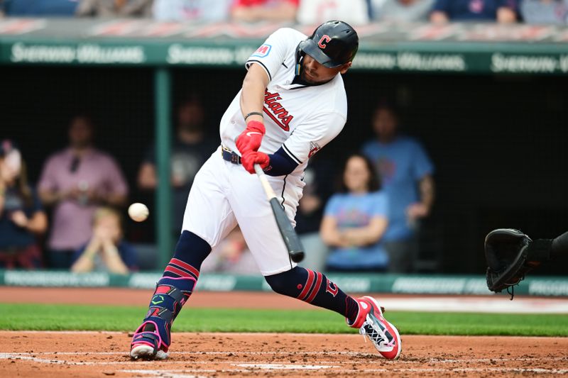 Apr 9, 2024; Cleveland, Ohio, USA; Cleveland Guardians first baseman Josh Naylor (22) hits a home run during the first inning against the Chicago White Sox at Progressive Field. Mandatory Credit: Ken Blaze-USA TODAY Sports