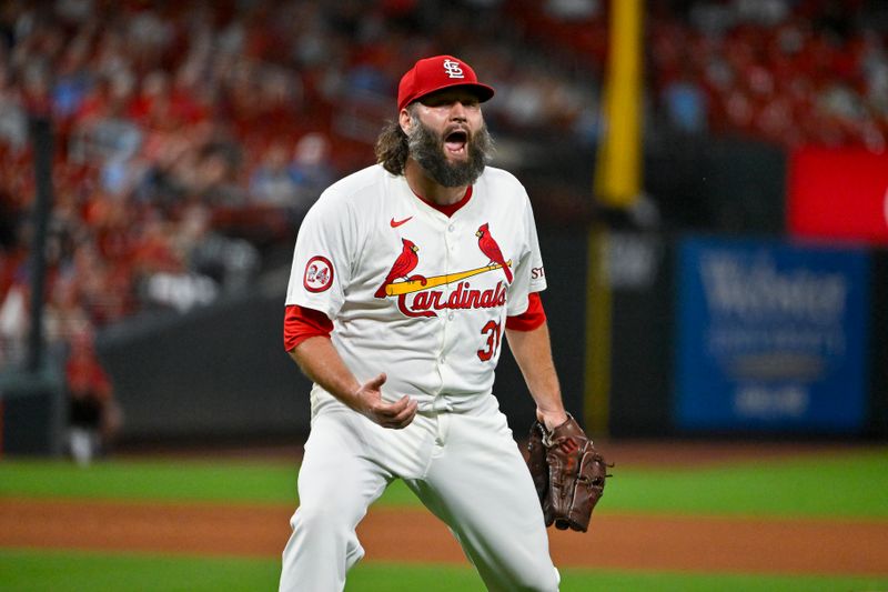 Sep 17, 2024; St. Louis, Missouri, USA;  St. Louis Cardinals starting pitcher Lance Lynn (31) reacts after inning ending double play against the Pittsburgh Pirates during the fifth inning at Busch Stadium. Mandatory Credit: Jeff Curry-Imagn Images