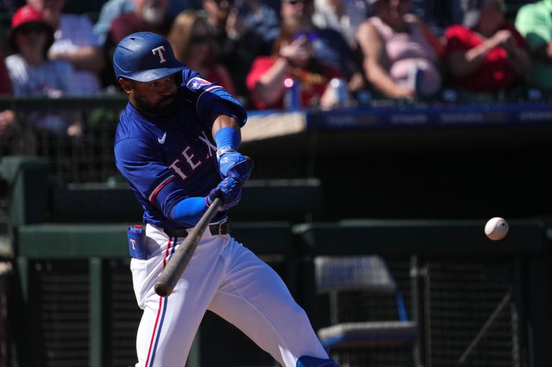 Mar 4, 2024; Surprise, Arizona, USA; Texas Rangers left fielder Derek Hill (75) bats against the Los Angeles Angels during the third inning at Surprise Stadium. Mandatory Credit: Joe Camporeale-USA TODAY Sports