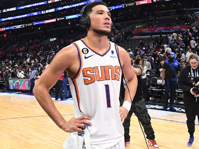 LOS ANGELES, CA - APRIL 22: Devin Booker #1 of the Phoenix Suns talks to the media after Round One Game Four of the 2023 NBA Playoffs against the LA Clippers on April 22, 2023 at Crypto.Com Arena in Los Angeles, California. NOTE TO USER: User expressly acknowledges and agrees that, by downloading and/or using this Photograph, user is consenting to the terms and conditions of the Getty Images License Agreement. Mandatory Copyright Notice: Copyright 2023 NBAE (Photo by Andrew D. Bernstein/NBAE via Getty Images)