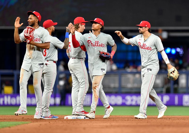 May 11, 2024; Miami, Florida, USA;  Philadelphia Phillies players celebrate after defeating the Miami Marlins at loanDepot Park. Mandatory Credit: Michael Laughlin-USA TODAY Sports