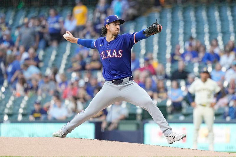 Jun 24, 2024; Milwaukee, Wisconsin, USA;  Texas Rangers pitcher Michael Lorenzen (23) throws a pitch during the first inning against the Milwaukee Brewers at American Family Field. Mandatory Credit: Jeff Hanisch-USA TODAY Sports