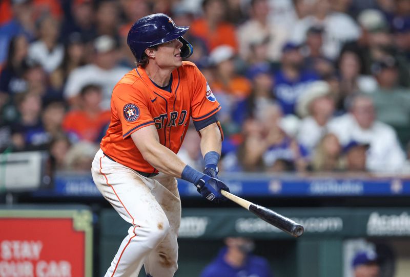 Jul 26, 2024; Houston, Texas, USA; Houston Astros center fielder Jake Meyers (6) hits a double during the eighth inning against the Los Angeles Dodgers at Minute Maid Park. Mandatory Credit: Troy Taormina-USA TODAY Sports