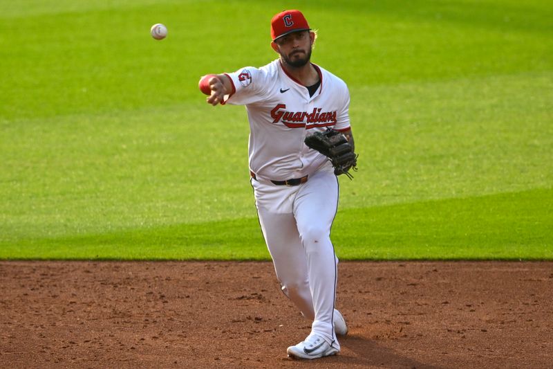 Jun 24, 2025; Cleveland, Ohio, USA; Cleveland Guardians shortstop Gabriel Arias (13) throws to first base in the third inning against the Toronto Blue Jays at Progressive Field. Mandatory Credit: David Richard-Imagn Images