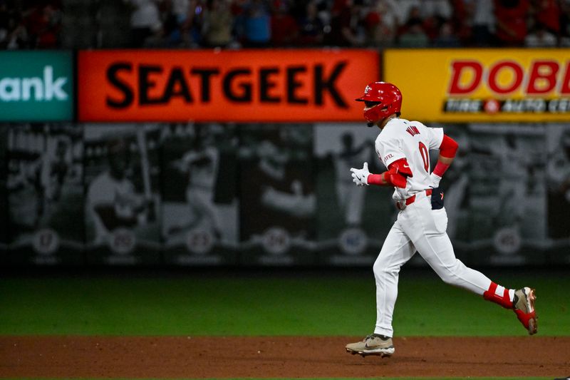 May 17, 2024; St. Louis, Missouri, USA;  St. Louis Cardinals shortstop Masyn Winn (0) runs the bases after hitting a two run home run against the Boston Red Sox during the sixth inning at Busch Stadium. Mandatory Credit: Jeff Curry-USA TODAY Sports