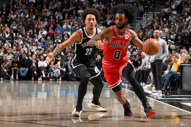 BROOKLYN, NY - NOVEMBER 9: Coby White #0 of the Chicago Bulls dribbles the ball during the game against the Brooklyn Nets on November 9, 2024 at Barclays Center in Brooklyn, New York. NOTE TO USER: User expressly acknowledges and agrees that, by downloading and or using this Photograph, user is consenting to the terms and conditions of the Getty Images License Agreement. Mandatory Copyright Notice: Copyright 2024 NBAE (Photo by David Dow/NBAE via Getty Images)