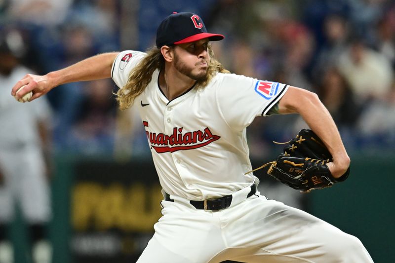 Apr 9, 2024; Cleveland, Ohio, USA; Cleveland Guardians relief pitcher Scott Barlow (58) throws a pitch during the eighth inning against the Chicago White Sox at Progressive Field. Mandatory Credit: Ken Blaze-USA TODAY Sports