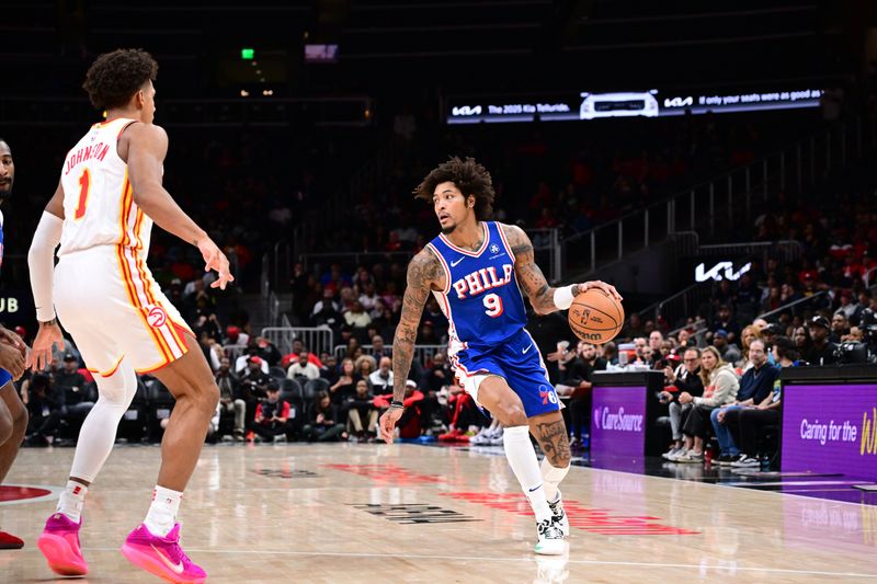 ATLANTA, GA - OCTOBER 14:  Kelly Oubre Jr. #9 of the Philadelphia 76ers dribbles the ball during the game against the Atlanta Hawks during a preseason game on October 14, 2024 at State Farm Arena in Atlanta, Georgia.  NOTE TO USER: User expressly acknowledges and agrees that, by downloading and/or using this Photograph, user is consenting to the terms and conditions of the Getty Images License Agreement. Mandatory Copyright Notice: Copyright 2024 NBAE (Photo by Adam Hagy/NBAE via Getty Images)