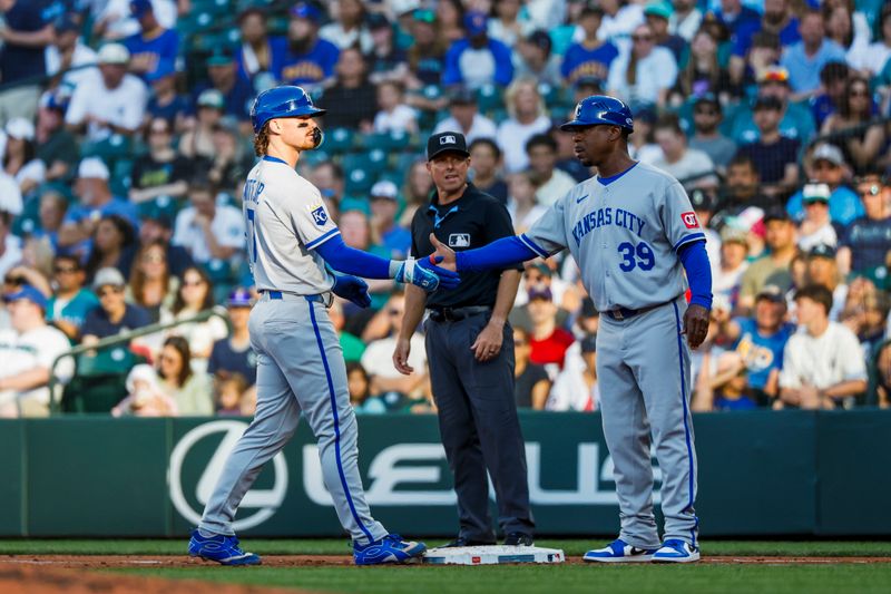 Jun 30, 2025; Seattle, Washington, USA; Kansas City Royals shortstop Bobby Witt Jr. (7) reacts after hitting an RBI-single against the Seattle Mariners during the third inning at T-Mobile Park. Mandatory Credit: Joe Nicholson-Imagn Images