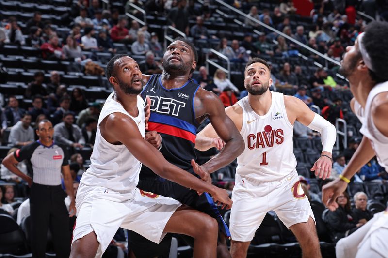 DETROIT, MI - MARCH 1: Evan Mobley #4 of the Cleveland Cavaliers boxes out during the game against the Detroit Pistons on March 1, 2024 at Little Caesars Arena in Detroit, Michigan. NOTE TO USER: User expressly acknowledges and agrees that, by downloading and/or using this photograph, User is consenting to the terms and conditions of the Getty Images License Agreement. Mandatory Copyright Notice: Copyright 2024 NBAE (Photo by Jeff Haynes/NBAE via Getty Images)