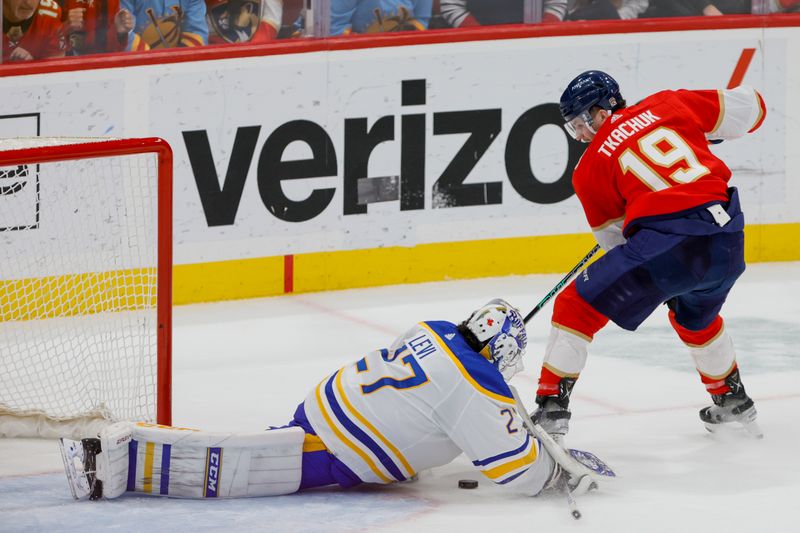 Apr 4, 2023; Sunrise, Florida, USA; Buffalo Sabres goaltender Devon Levi (27) makes a save after a shot from Florida Panthers left wing Matthew Tkachuk (19) during the third period at FLA Live Arena. Mandatory Credit: Sam Navarro-USA TODAY Sports