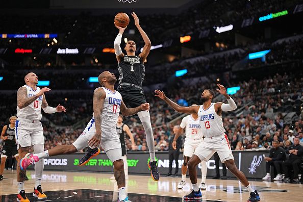 SAN ANTONIO, TX - NOVEMBER 22: Victor Wembanyama #1 of the San Antonio Spurs shoots the ball during the game against the LA Clippers on November 22, 2023 at the Frost Bank Center in San Antonio, Texas. NOTE TO USER: User expressly acknowledges and agrees that, by downloading and or using this photograph, user is consenting to the terms and conditions of the Getty Images License Agreement. Mandatory Copyright Notice: Copyright 2023 NBAE (Photos by Darren Carroll/NBAE via Getty Images)