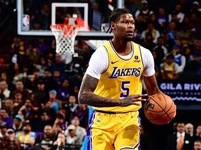 PHOENIX, AZ - NOVEMBER 10: Cam Reddish #5 of the Los Angeles Lakers looks to pass the ball during the game against the Phoenix Suns during the In-Season Tournament on November 10, 2023 at Footprint Center in Phoenix, Arizona. NOTE TO USER: User expressly acknowledges and agrees that, by downloading and or using this photograph, user is consenting to the terms and conditions of the Getty Images License Agreement. Mandatory Copyright Notice: Copyright 2023 NBAE (Photo by Barry Gossage/NBAE via Getty Images)