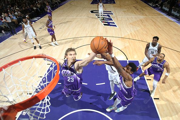 SALT LAKE CITY, UT - DECEMBER 18: Players go up for the rebound during the game on December 18, 2023 at vivint.SmartHome Arena in Salt Lake City, Utah. NOTE TO USER: User expressly acknowledges and agrees that, by downloading and or using this Photograph, User is consenting to the terms and conditions of the Getty Images License Agreement. Mandatory Copyright Notice: Copyright 2023 NBAE (Photo by Melissa Majchrzak/NBAE via Getty Images)