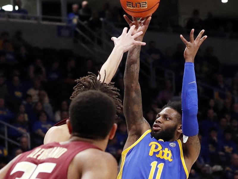 Jan 21, 2023; Pittsburgh, Pennsylvania, USA; Pittsburgh Panthers guard Jamarius Burton (11) shoots against the Florida State Seminoles during the second half at the Petersen Events Center. The Seminoles won 71-64. Mandatory Credit: Charles LeClaire-USA TODAY Sports