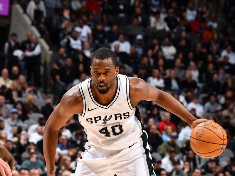 SAN ANTONIO, TX - JANUARY 17: Harrison Barnes #40 of the San Antonio Spurs dribbles the ball during the game against the Memphis Grizzlies on January 17, 2025 at the Frost Bank Center in San Antonio, Texas. NOTE TO USER: User expressly acknowledges and agrees that, by downloading and or using this photograph, user is consenting to the terms and conditions of the Getty Images License Agreement. Mandatory Copyright Notice: Copyright 2025 NBAE (Photos by Barry Gossage/NBAE via Getty Images)