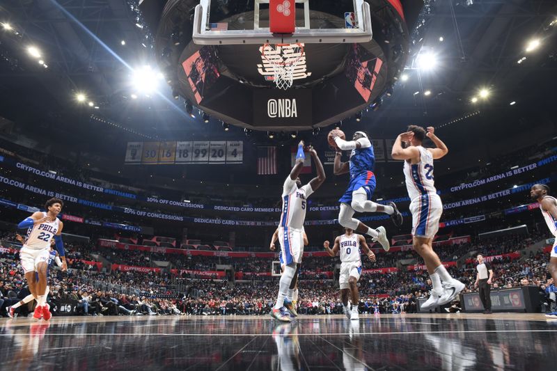 LOS ANGELES, CA - JANUARY 17: Reggie Jackson #1 of the LA Clippers drives to the basket during the game against the Philadelphia 76ers on January 17, 2023 at Crypto.Com Arena in Los Angeles, California. NOTE TO USER: User expressly acknowledges and agrees that, by downloading and/or using this Photograph, user is consenting to the terms and conditions of the Getty Images License Agreement. Mandatory Copyright Notice: Copyright 2023 NBAE (Photo by Adam Pantozzi/NBAE via Getty Images)