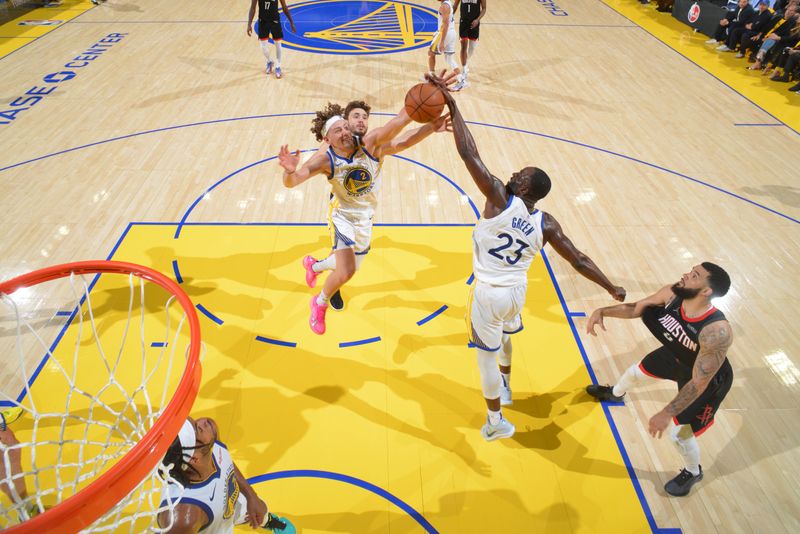 SAN FRANCISCO, CA - APRIL 26:  Brandin Podziemski #2 of the Golden State Warriors goes up for the rebound during the game against the Houston Rockets  during Round 1 Game 3 of the 2025 NBA Playoffs   on April 26, 2025 at Chase Center in San Francisco, California. NOTE TO USER: User expressly acknowledges and agrees that, by downloading and or using this photograph, user is consenting to the terms and conditions of Getty Images License Agreement. Mandatory Copyright Notice: Copyright 2025 NBAE (Photo by Jesse D. Garrabrant/NBAE via Getty Images)