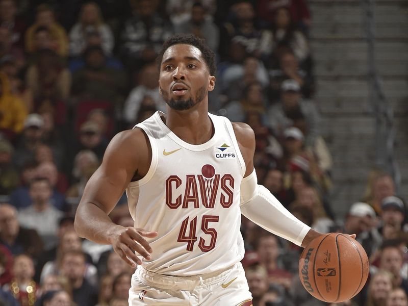 CLEVELAND, OH - NOVEMBER 9: Donovan Mitchell #45 of the Cleveland Cavaliers brings the ball up court during the game against the Brooklyn Nets on November 9, 2024 at Rocket Mortgage FieldHouse in Cleveland, Ohio. NOTE TO USER: User expressly acknowledges and agrees that, by downloading and/or using this Photograph, user is consenting to the terms and conditions of the Getty Images License Agreement. Mandatory Copyright Notice: Copyright 2024 NBAE (Photo by David Liam Kyle/NBAE via Getty Images)