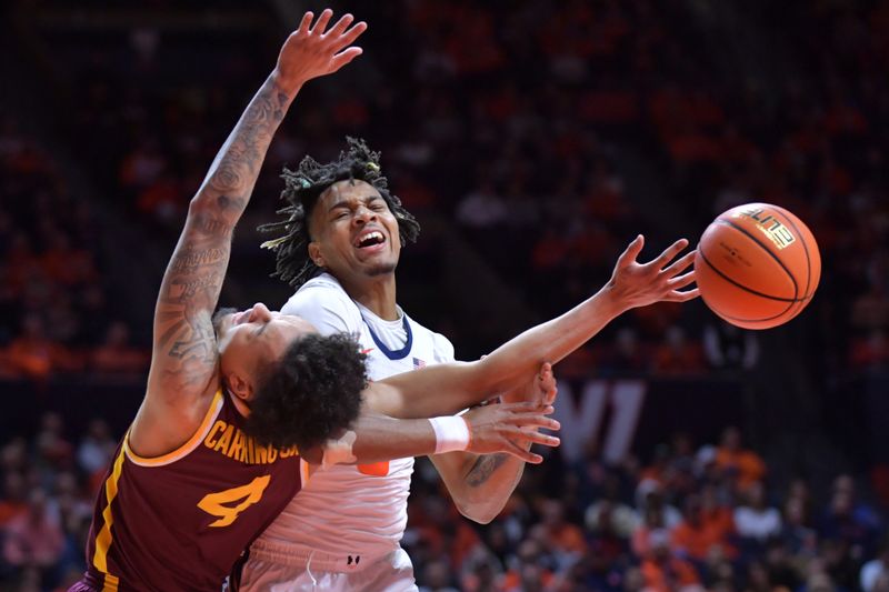 Feb 28, 2024; Champaign, Illinois, USA; Illinois Fighting Illini guard Terrence Shannon Jr. (0) drives the ball into Minnesota Golden Gophers guard Braeden Carrington (4) during the first half at State Farm Center. Mandatory Credit: Ron Johnson-USA TODAY Sports