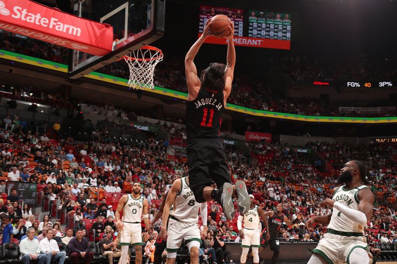 MIAMI, FL - FEBRUARY 11: Jaime Jaquez Jr. #11 of the Miami Heat dunks the ball during the game against the Boston Celtics on February 11, 2024 at Kaseya Center in Miami, Florida. NOTE TO USER: User expressly acknowledges and agrees that, by downloading and or using this Photograph, user is consenting to the terms and conditions of the Getty Images License Agreement. Mandatory Copyright Notice: Copyright 2024 NBAE (Photo by Issac Baldizon/NBAE via Getty Images)