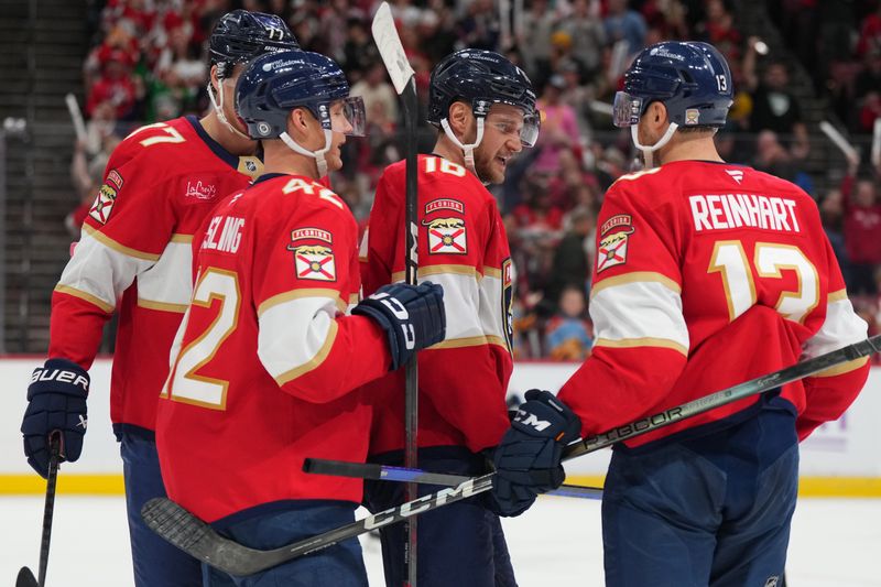 Nov 16, 2024; Sunrise, Florida, USA;  Florida Panthers center Aleksander Barkov (16) celebrates with teammates after scoring a short-handed goal against the Winnipeg Jets during the second period at Amerant Bank Arena. Mandatory Credit: Jim Rassol-Imagn Images