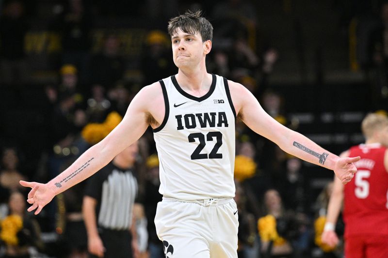 Mar 5, 2023; Iowa City, Iowa, USA; Iowa Hawkeyes forward Patrick McCaffery (22) reacts during the first half against the Nebraska Cornhuskers at Carver-Hawkeye Arena. Mandatory Credit: Jeffrey Becker-USA TODAY Sports