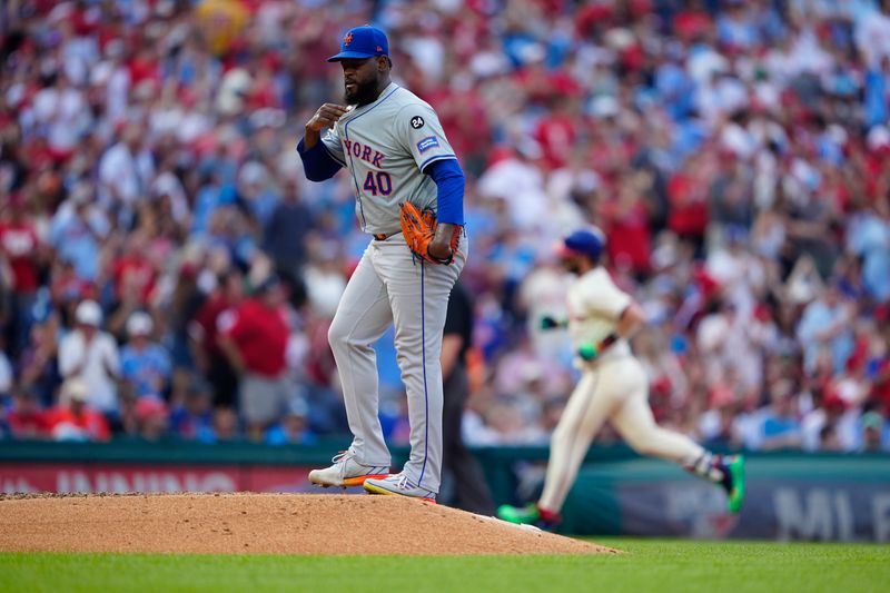 Sep 14, 2024; Philadelphia, Pennsylvania, USA; New York Mets pitcher Luis Severino (40) reacts to giving up a home run to Philadelphia Phillies first baseman Bryce Harper (3) during the fourth inning at Citizens Bank Park. Mandatory Credit: Gregory Fisher-Imagn Images