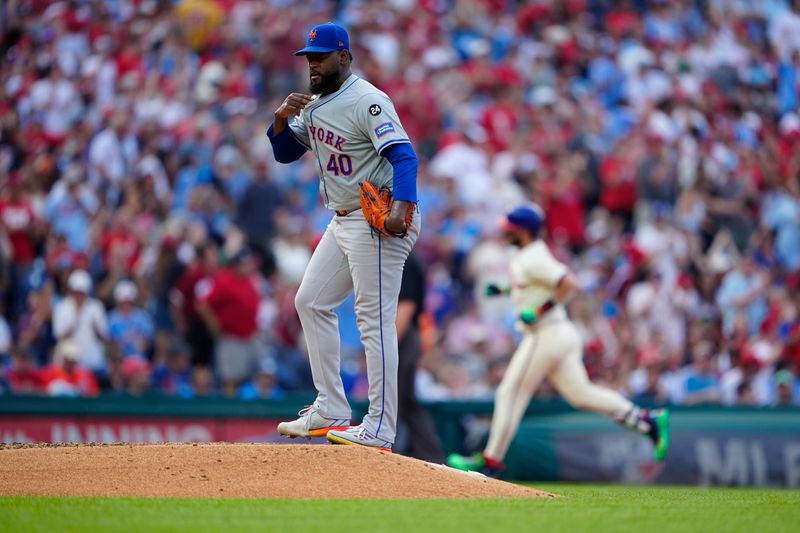 Sep 14, 2024; Philadelphia, Pennsylvania, USA; New York Mets pitcher Luis Severino (40) reacts to giving up a home run to Philadelphia Phillies first baseman Bryce Harper (3) during the fourth inning at Citizens Bank Park. Mandatory Credit: Gregory Fisher-Imagn Images