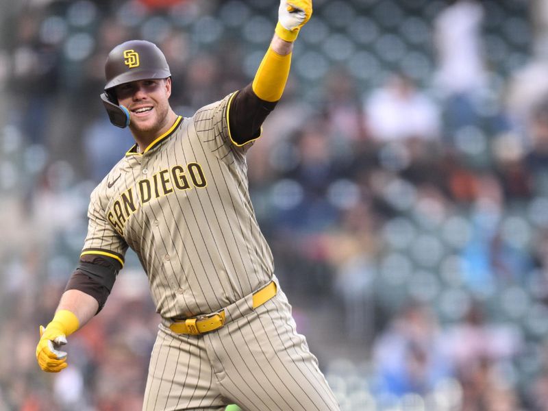 Jun 4, 2025; San Francisco, California, USA;  San Diego Padres first baseman Gavin Sheets (30) celebrates his RBI triple against the San Francisco Giants in the first inning at Oracle Park. Mandatory Credit: Eakin Howard-Imagn Images