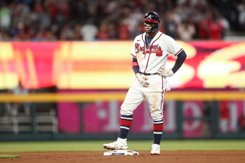 Oct 12, 2022; Atlanta, Georgia, USA; Atlanta Braves right fielder Ronald Acuna Jr. (13) stands at second baes against the Philadelphia Phillies in the sixth inning during game two of the NLDS for the 2022 MLB Playoffs at Truist Park. Mandatory Credit: Brett Davis-USA TODAY Sports