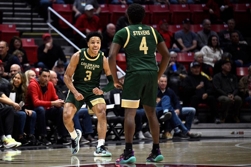 Feb 13, 2024; San Diego, California, USA; Colorado State Rams guard Josiah Strong (3) celebrates with guard Isaiah Stevens (4) during the first half against the San Diego State Aztecs at Viejas Arena. Mandatory Credit: Orlando Ramirez-USA TODAY Sports