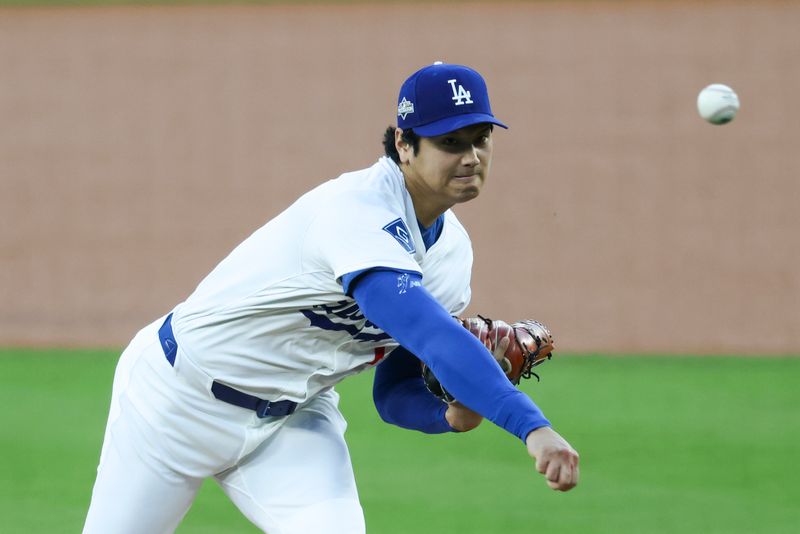 Oct 17, 2025; Los Angeles, California, USA; Los Angeles Dodgers two-way player Shohei Ohtani (17) throws against the Milwaukee Brewers during the first inning of game four of the NLCS round for the 2025 MLB playoffs at Dodger Stadium. Mandatory Credit: Kiyoshi Mio-Imagn Images