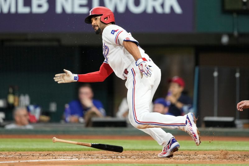 Jun 27, 2023; Arlington, Texas, USA; Texas Rangers second baseman Marcus Semien (2) runs to first base on his single against the Detroit Tigers during the fourth inning at Globe Life Field. Mandatory Credit: Jim Cowsert-USA TODAY Sports