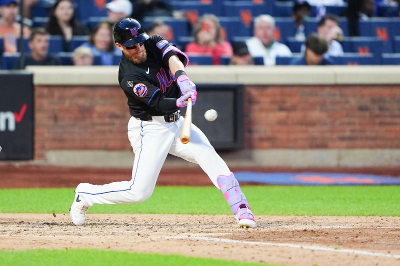 May 31, 2024; New York City, New York, USA; New York Mets center fielder Harrison Bader (44) hits a double against the Arizona Diamondbacks during the third inning at Citi Field. Mandatory Credit: Gregory Fisher-USA TODAY Sports