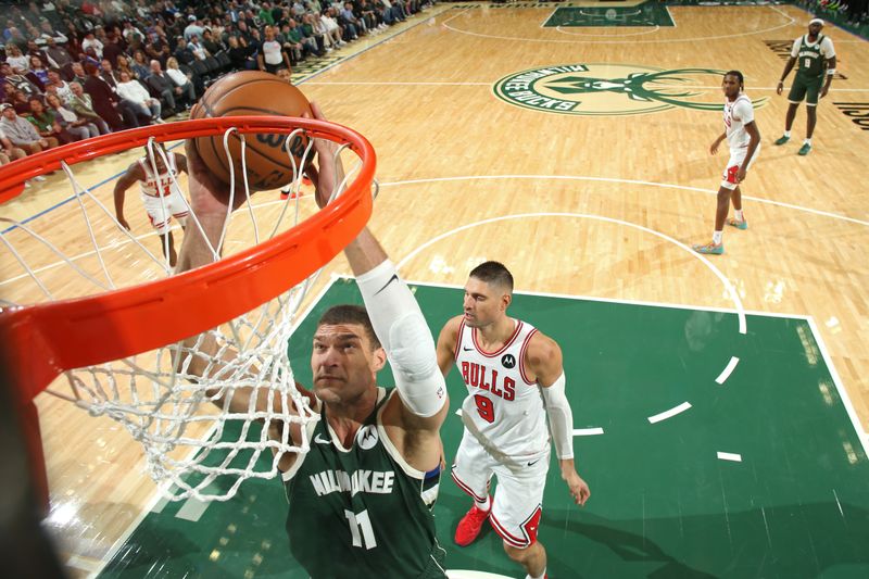 MILWAUKEE, WI - OCTOBER 25: Brook Lopez #11 of the Milwaukee Bucks drives to the basket during the game against the Chicago Bulls on October 25, 2024 at the Fiserv Forum Center in Milwaukee, Wisconsin. NOTE TO USER: User expressly acknowledges and agrees that, by downloading and or using this Photograph, user is consenting to the terms and conditions of the Getty Images License Agreement. Mandatory Copyright Notice: Copyright 2024 NBAE (Photo by Gary Dineen/NBAE via Getty Images).