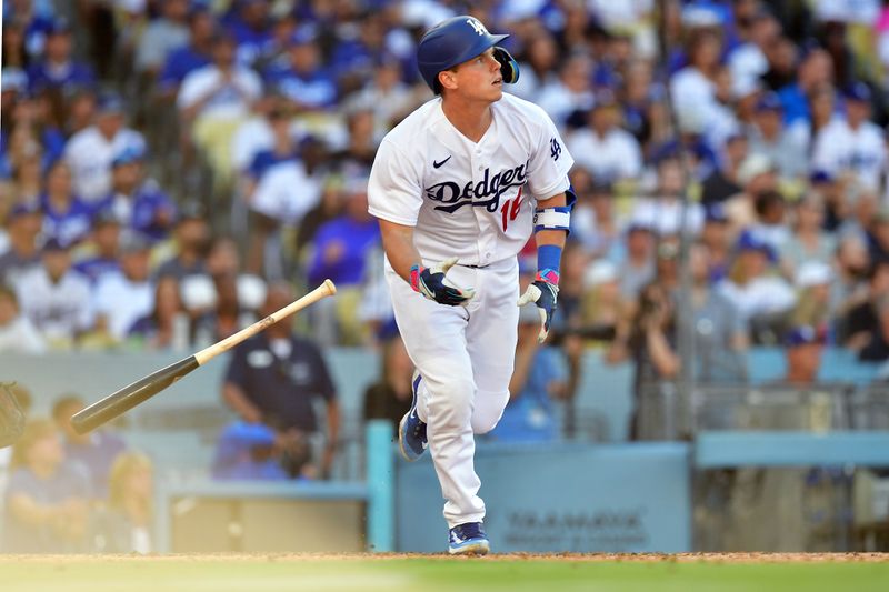 Jun 25, 2023; Los Angeles, California, USA; Los Angeles Dodgers catcher Will Smith (16) hits a two run home run against the Houston Astros during the eighth inning at Dodger Stadium. Mandatory Credit: Gary A. Vasquez-USA TODAY Sports