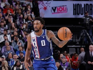 SACRAMENTO, CA - DECEMBER 2: Malik Monk #0 of the Sacramento Kings dribbles the ball during the game against the Denver Nuggets on December 2, 2023 at Golden 1 Center in Sacramento, California. NOTE TO USER: User expressly acknowledges and agrees that, by downloading and or using this Photograph, user is consenting to the terms and conditions of the Getty Images License Agreement. Mandatory Copyright Notice: Copyright 2023 NBAE (Photo by Rocky Widner/NBAE via Getty Images)