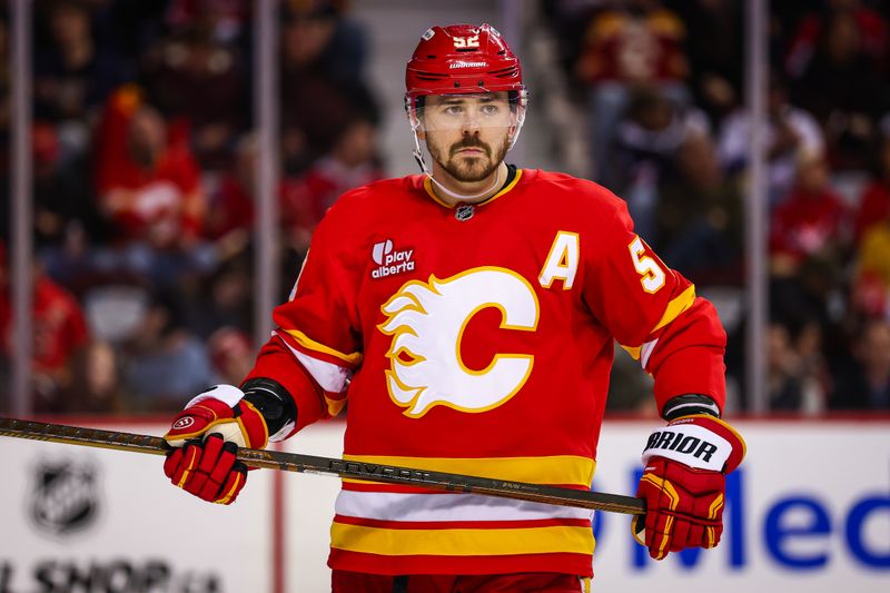 Jan 23, 2026; Calgary, Alberta, CAN; Calgary Flames defenseman MacKenzie Weegar (52) during the third period against the Washington Capitals at Scotiabank Saddledome. Mandatory Credit: Sergei Belski-Imagn Images