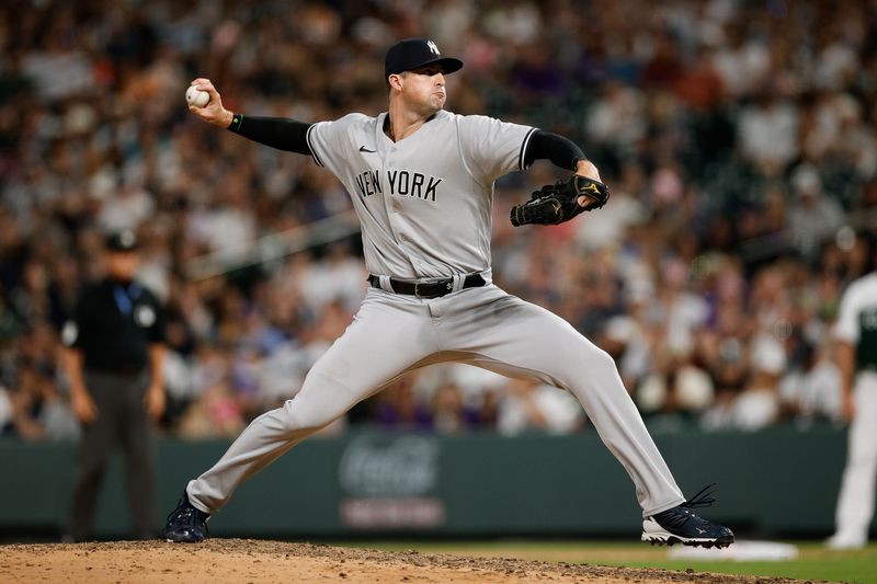 Jul 15, 2023; Denver, Colorado, USA; New York Yankees relief pitcher Clay Holmes (35) pitches in the ninth inning against the Colorado Rockies at Coors Field. Mandatory Credit: Isaiah J. Downing-USA TODAY Sports