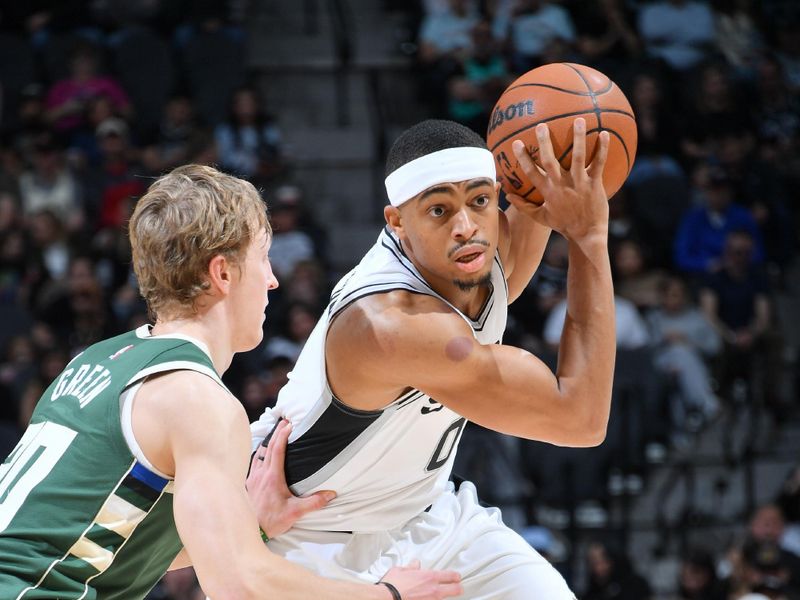 SAN ANTONIO, TX - JANUARY 31: Keldon Johnson #0 of the San Antonio Spurs handles the ball during the game against the Milwaukee Bucks on January 31, 2025 at the Frost Bank Center in San Antonio, Texas. NOTE TO USER: User expressly acknowledges and agrees that, by downloading and or using this photograph, user is consenting to the terms and conditions of the Getty Images License Agreement. Mandatory Copyright Notice: Copyright 2025 NBAE (Photos by Michael Gonzales/NBAE via Getty Images)