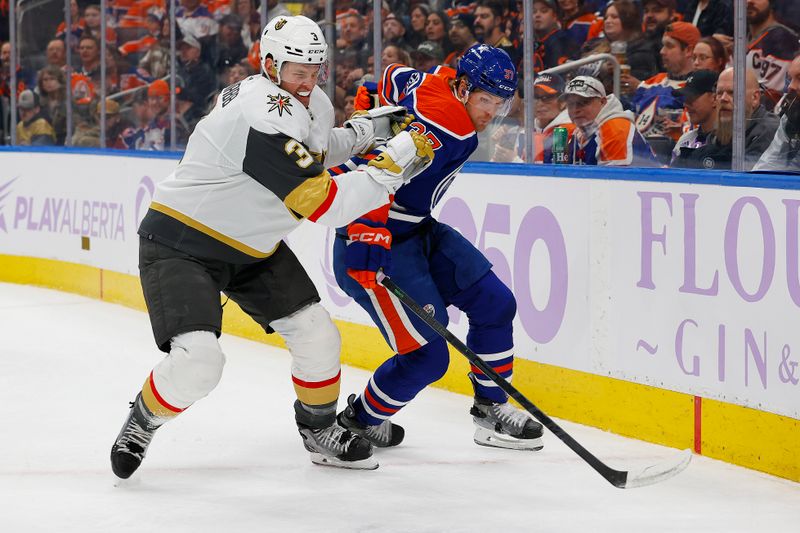 Nov 28, 2023; Edmonton, Alberta, CAN; Vegas Golden Knights defensemen Brayden McNabb (3) and Edmonton Oilers forward Warren Foegele (37) battle along the boards for a loose puck during the first period at Rogers Place. Mandatory Credit: Perry Nelson-USA TODAY Sports