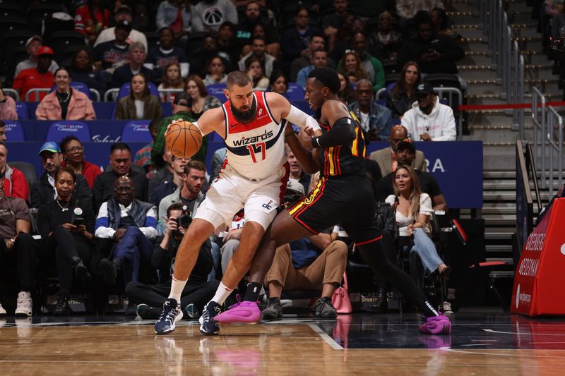 WASHINGTON, DC -? OCTOBER 30:  Jonas Valanciunas #17 of the Washington Wizards dribbles the ball during the game against the Atlanta Hawks during a regular season game on October 30, 2024 at Capital One Arena in Washington, DC. NOTE TO USER: User expressly acknowledges and agrees that, by downloading and or using this Photograph, user is consenting to the terms and conditions of the Getty Images License Agreement. Mandatory Copyright Notice: Copyright 2024 NBAE (Photo by Kenny Giarla/NBAE via Getty Images)