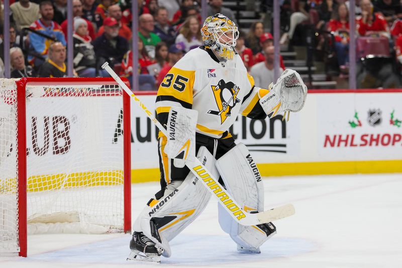 Dec 8, 2023; Sunrise, Florida, USA; Pittsburgh Penguins goaltender Tristan Jarry (35) defends his net against the Florida Panthers during the second period at Amerant Bank Arena. Mandatory Credit: Sam Navarro-USA TODAY Sports