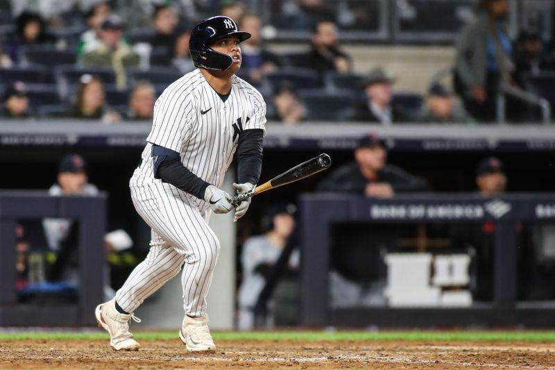 May 2, 2023; Bronx, New York, USA;  New York Yankees designated hitter Willie Calhoun (24) hits a home run in the seventh inning against the Cleveland Guardians at Yankee Stadium. Mandatory Credit: Wendell Cruz-USA TODAY Sports